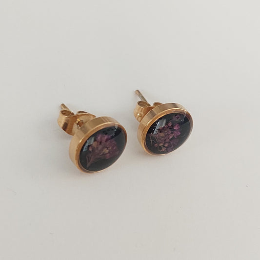 Stud earrings light purple color