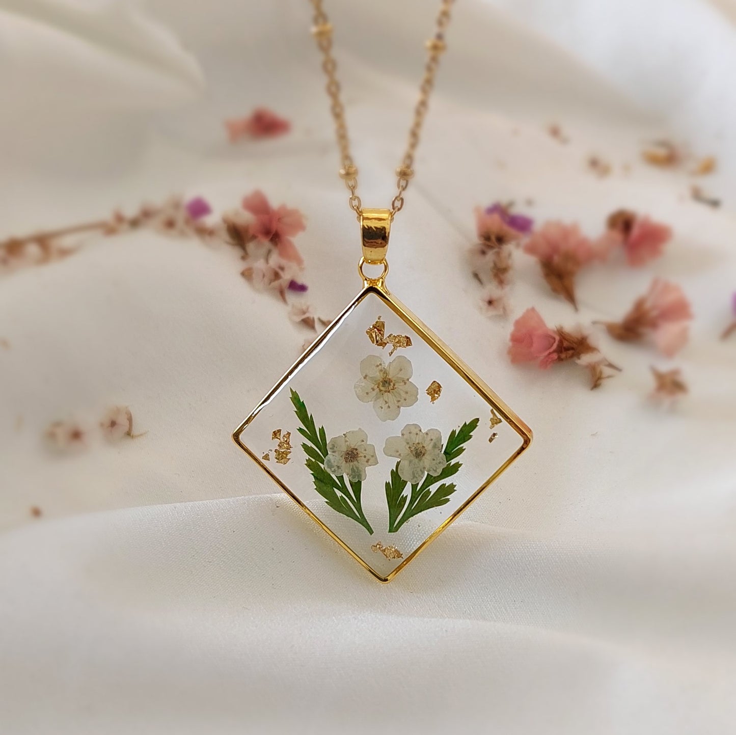 Real white daffodils and fern leaves flower necklace